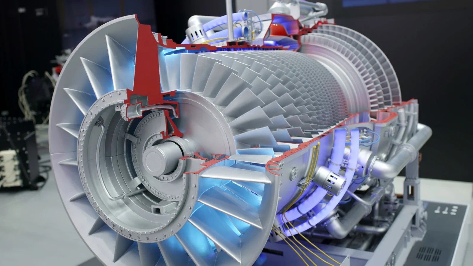 Cutaway aero engine model showing its fan and compressor stages