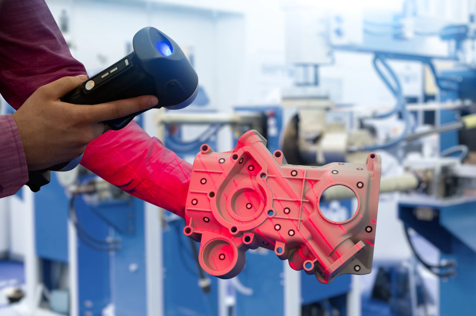 Handheld 3D scanner capturing the geometry of a metal housing