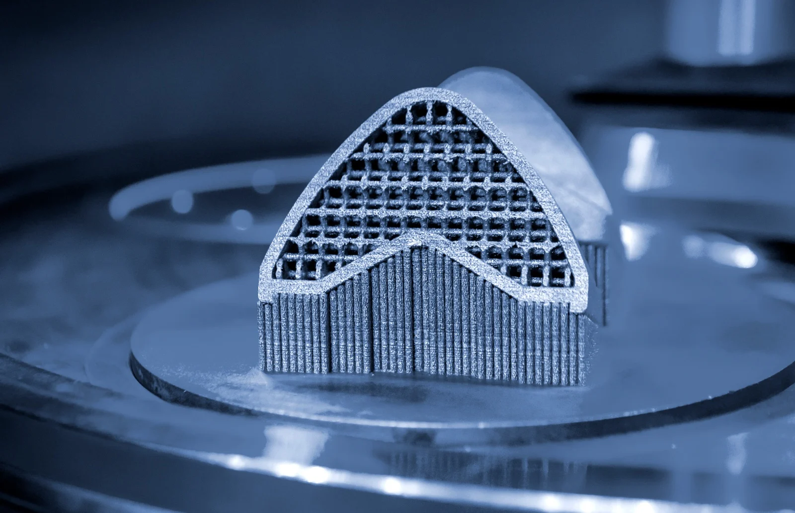 Lattice-filled aerospace structural frame on a printer build plate