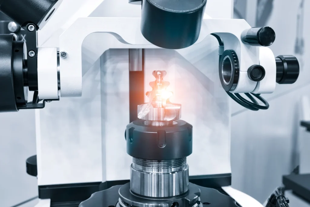 Metallurgical microscope examining a sectioned metal sample in the lab